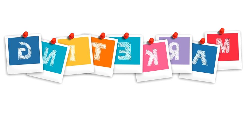 Person writing goals on notebook with focused expression